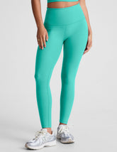 blue high-waisted midi length leggings.